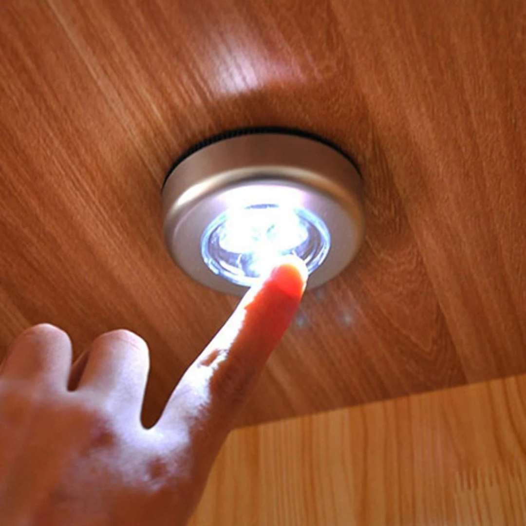 Set of three Avira LED battery-powered tap push lights with easy-on switches, ideal for illuminating dark areas.
